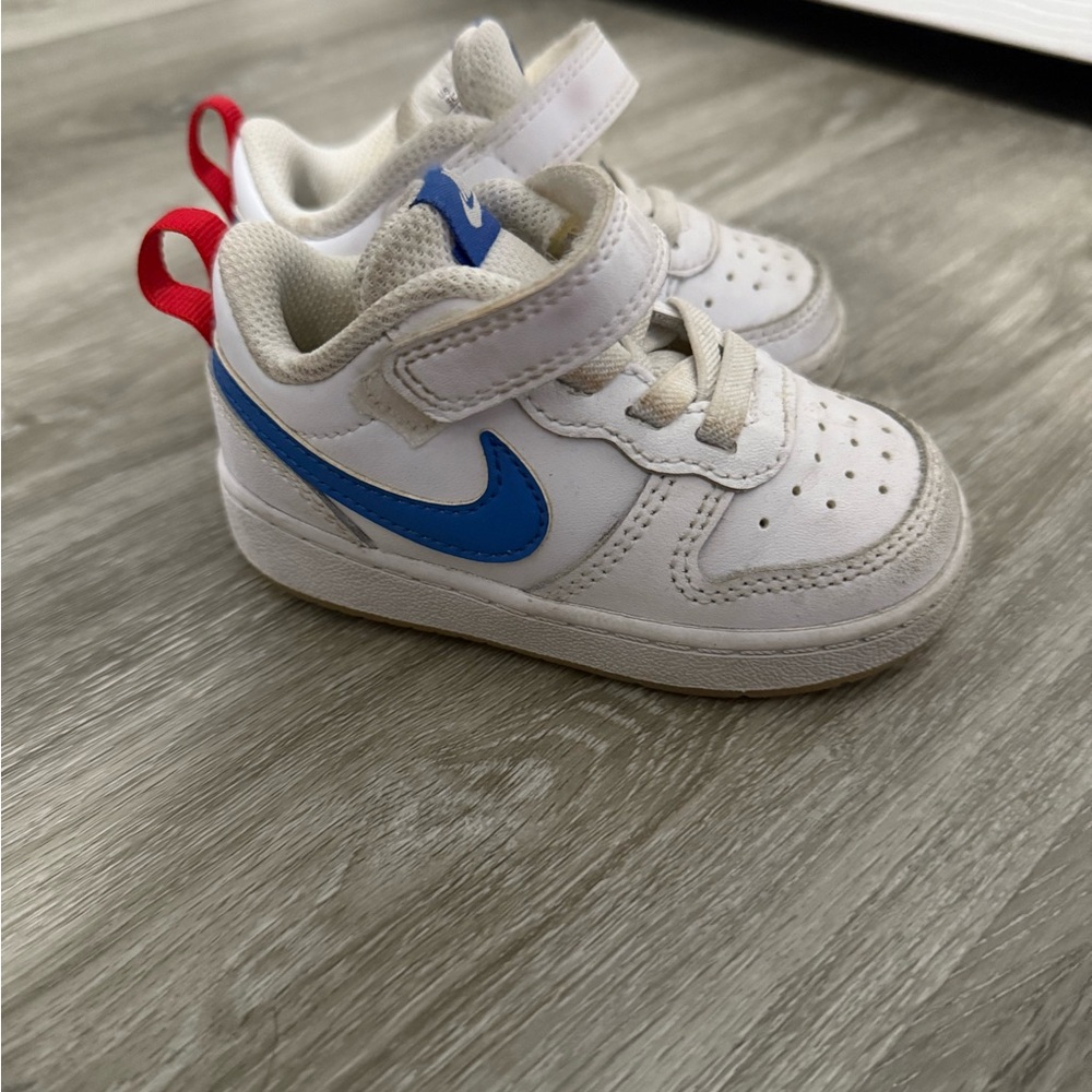 Nike Kids White Sneakers with Blue Swoosh